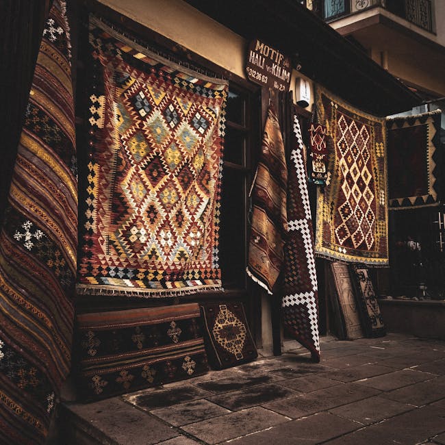 Traditional Turkish kilims displayed in a street market in Ankara, showcasing vibrant geometric patterns and cultural heritage.